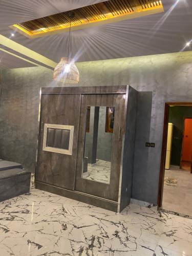 a mirror on a wall in a room at Keur lumières in Dakar