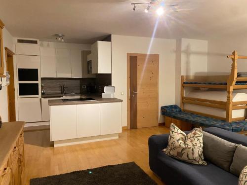 Kuchyň nebo kuchyňský kout v ubytování Ladin Apartment
