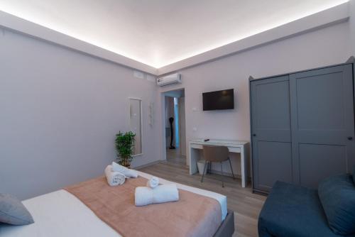 Ένα ή περισσότερα κρεβάτια σε δωμάτιο στο Frida guest house