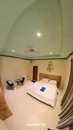 Кровать или кровати в номере Wish Maamigili