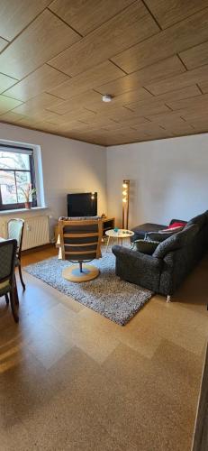 Ruang duduk di Ferienwohnung Waldenburg Sachsen