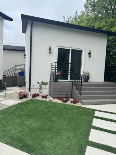 a house with a green lawn in front of it at Angies Oasis in San Ramon