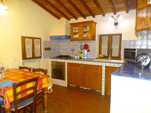 Kuchyň nebo kuchyňský kout v ubytování Agriturismo Conca Verde