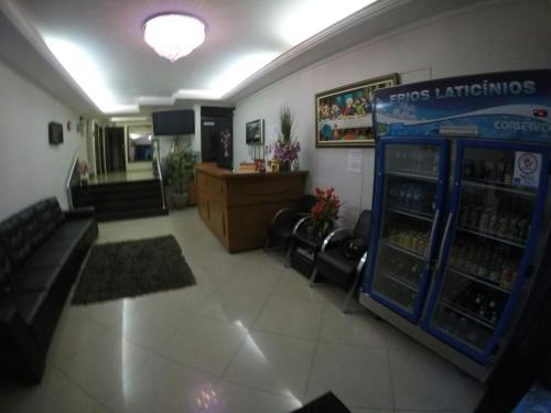 a room with a pharmacyacistacistacistacist at Hotel Aparecida do Norte in Aparecida