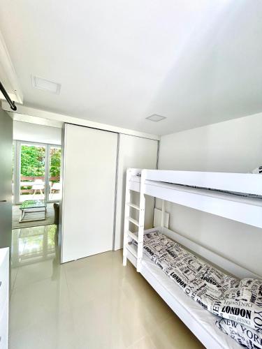 a bedroom with two bunk beds in it at MRM Apartman Tihany in Tihany