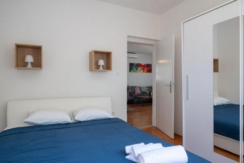 Ένα ή περισσότερα κρεβάτια σε δωμάτιο στο Apartman Sarah