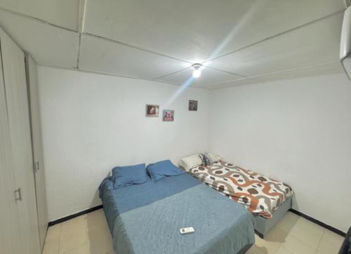 Ένα ή περισσότερα κρεβάτια σε δωμάτιο στο Casa Garupal