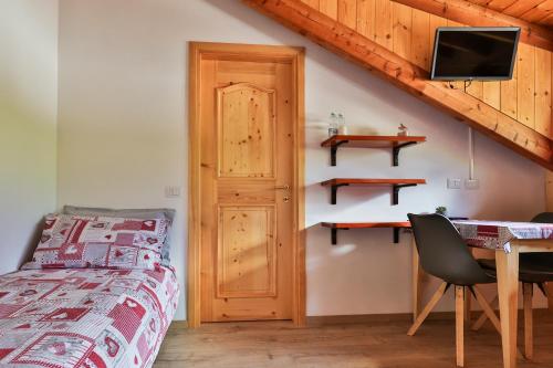 Postel nebo postele na pokoji v ubytování B&B La vecchia posta