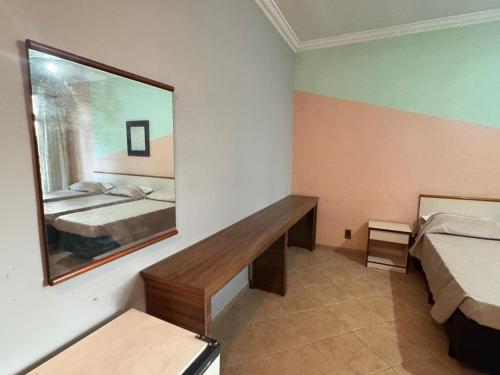 Ein Bett oder Betten in einem Zimmer der Unterkunft Valle Hotel