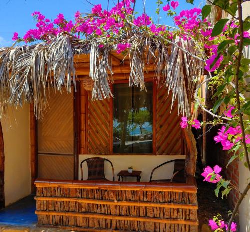 Κήπος έξω από το Muelle Viejo Bungalows