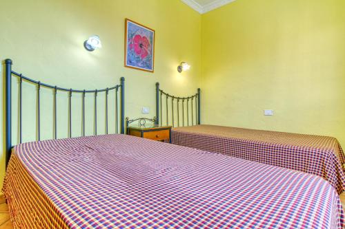 Katil atau katil-katil dalam bilik di Apartamentos Todoque
