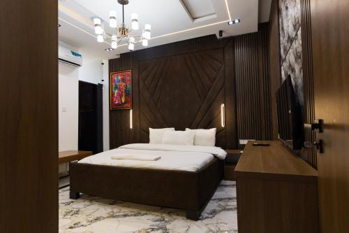 Ένα ή περισσότερα κρεβάτια σε δωμάτιο στο Nuelin Luxury Apartments Katampe