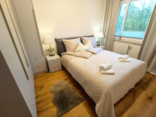 Ein Bett oder Betten in einem Zimmer der Unterkunft Oaza spokoju - Walendów