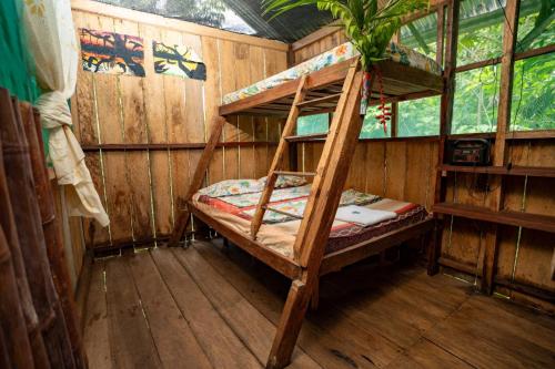 Postel nebo postele na pokoji v ubytování hostal las mariposas
