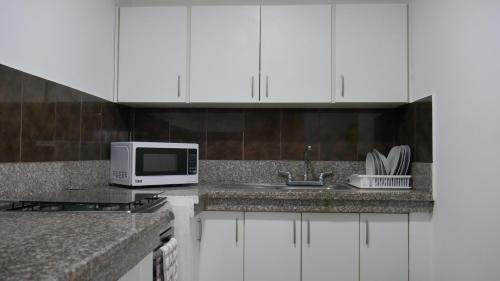 Park View Hostel & Suitesにあるキッチンまたは簡易キッチン