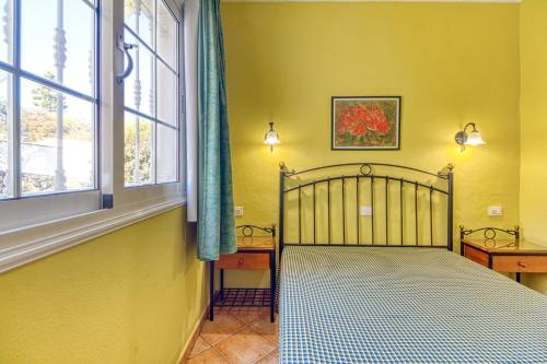 Katil atau katil-katil dalam bilik di Apartamentos Todoque