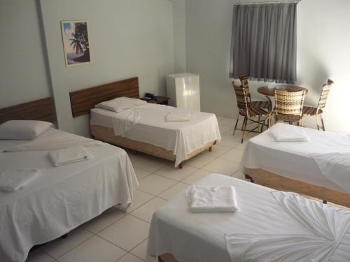 Ένα ή περισσότερα κρεβάτια σε δωμάτιο στο Via Norte Hotel