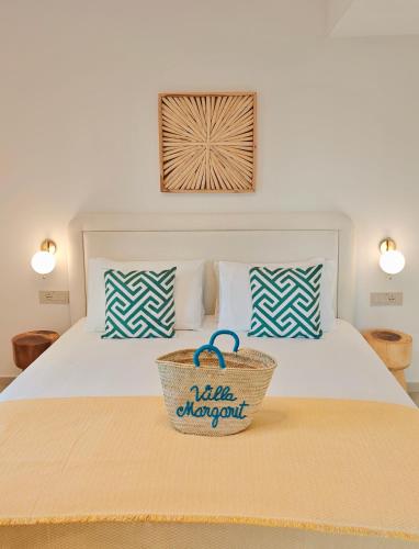 Ένα ή περισσότερα κρεβάτια σε δωμάτιο στο VILLA MARGARIT Boutique Hotel
