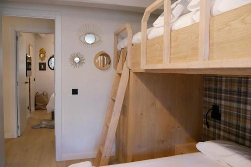 Ένα ή περισσότερα κρεβάτια σε δωμάτιο στο Arties Lodge