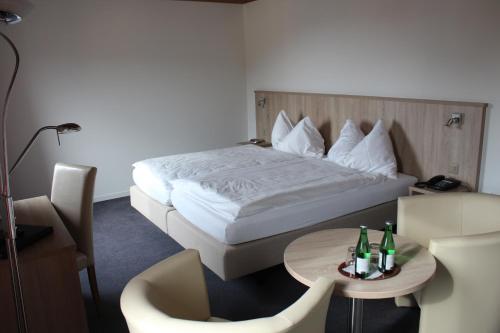 
Ein Bett oder Betten in einem Zimmer der Unterkunft Martinshof
