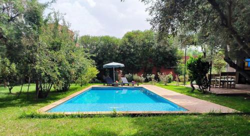 La alberca dentro o cerca de Charming Villa with Pool