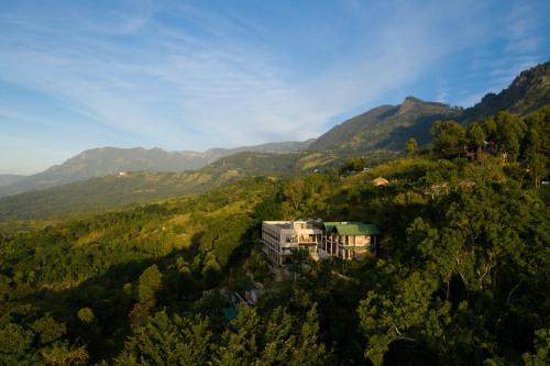 an aerial view of a house in the middle of a mountain at Akway Resort Beragala Haputale in Beragala