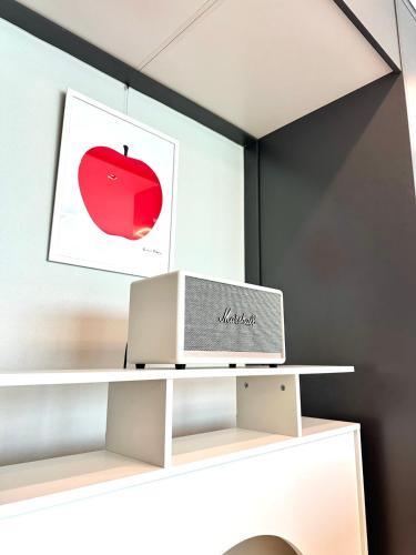 an office with a laptop on a white shelf at THE DECEMBER STAY Busan Songdo Ocean Terrace in Busan