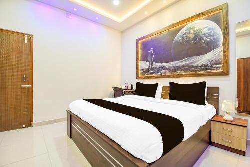 Postel nebo postele na pokoji v ubytování Hotel O Moon Guest House