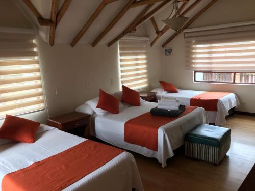 Postel nebo postele na pokoji v ubytování hotel el portal de las Flores, Alojamiento Rural