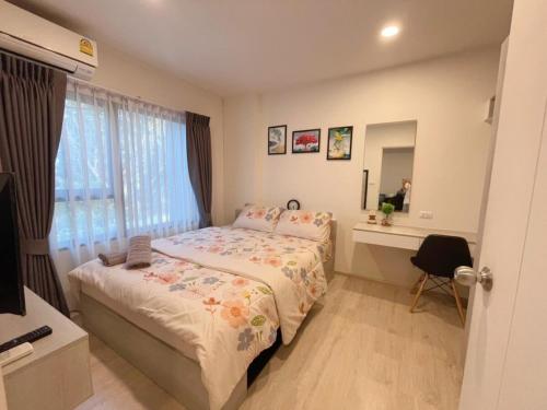 Postel nebo postele na pokoji v ubytování Escent ville Chiang Mai F3B2