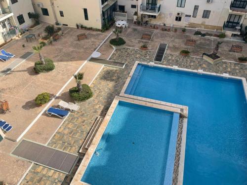 Πισίνα στο ή κοντά στο Apartment in Bugibba center