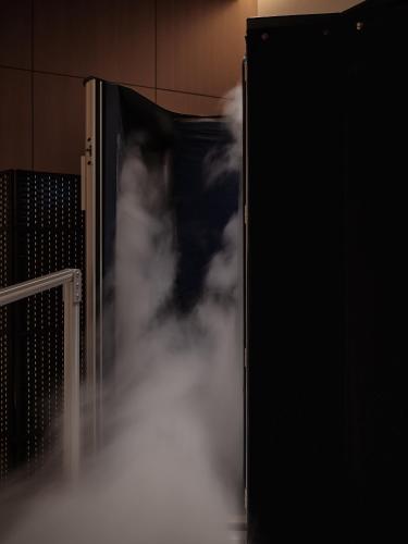 a person is standing inside of a refrigerator at Patina Osaka in Osaka