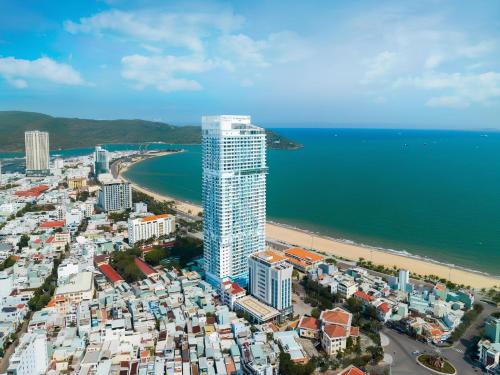 an aerial view of a city and the beach at TMS Quy Nhơn - Có Ban Công Và Tầm Nhìn Biển, Phù Hợp Với Gia Đình Có Bếp in Quy Nhon