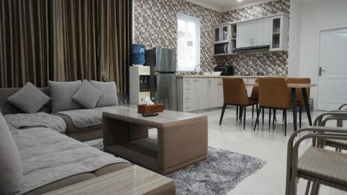 Kuchyň nebo kuchyňský kout v ubytování Diyar Villas Puncak F4/8