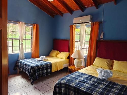 Una cama o camas en una habitación de Risoli Villa
