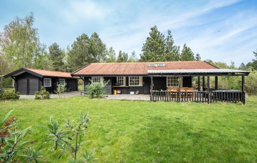 a house with a large yard in front of it at Stunning Home In Martofte With Wifi in Martofte