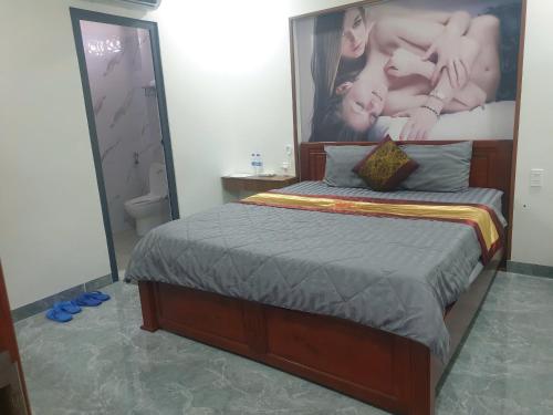 Postel nebo postele na pokoji v ubytování Khách sạn Cát Tường 68