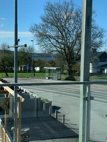 an empty parking lot with a bus stop at Lygnerns Pensionat & Konferens in Sätila