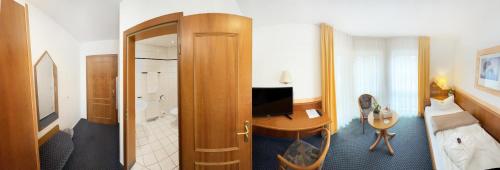 TV a/nebo společenská místnost v ubytování Hotel Schöne Aussicht
