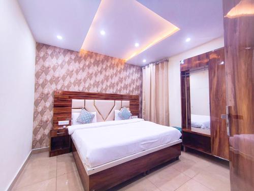 Postel nebo postele na pokoji v ubytování Hotel M S Resort Dalhousie