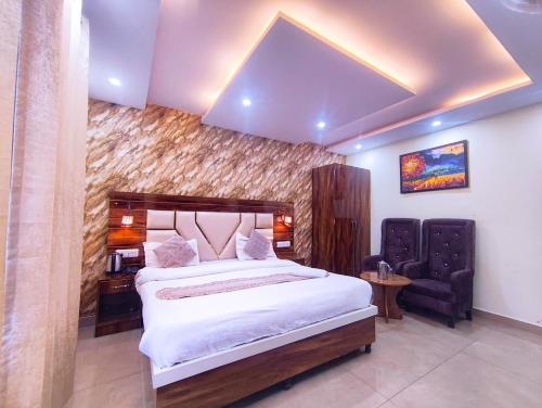 Postel nebo postele na pokoji v ubytování Hotel M S Resort Dalhousie