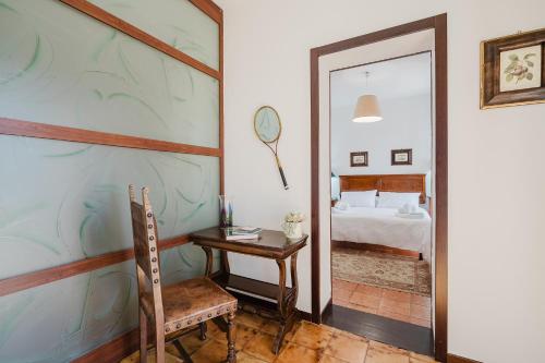Ένα ή περισσότερα κρεβάτια σε δωμάτιο στο Villa Vittoria