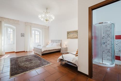Ένα ή περισσότερα κρεβάτια σε δωμάτιο στο Villa Vittoria