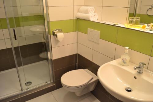 Koupelna v ubytování Hotel Arkáda