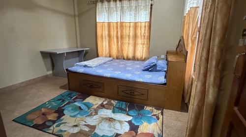 Postel nebo postele na pokoji v ubytování Chitwan Comforts Apt 1 Room 1
