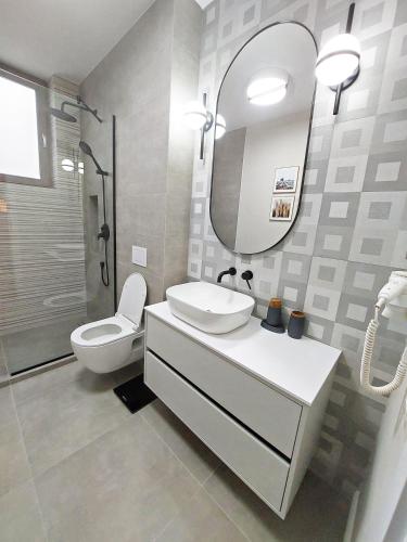 Koupelna v ubytování VIMANIS aparthotel