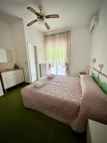 Postel nebo postele na pokoji v ubytování Bed&Breakfast Villa Lorena