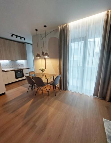Kuchyň nebo kuchyňský kout v ubytování VIMANIS aparthotel