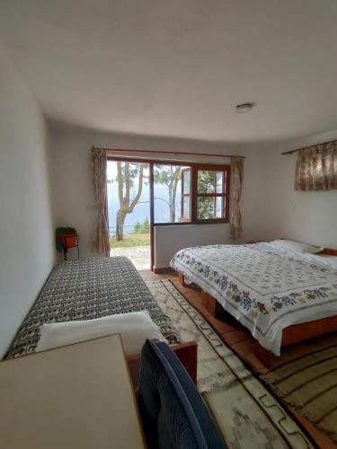 En eller flere senge i et værelse på Panorama Resort