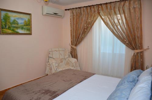 Postel nebo postele na pokoji v ubytování Ana's Cozy Corner